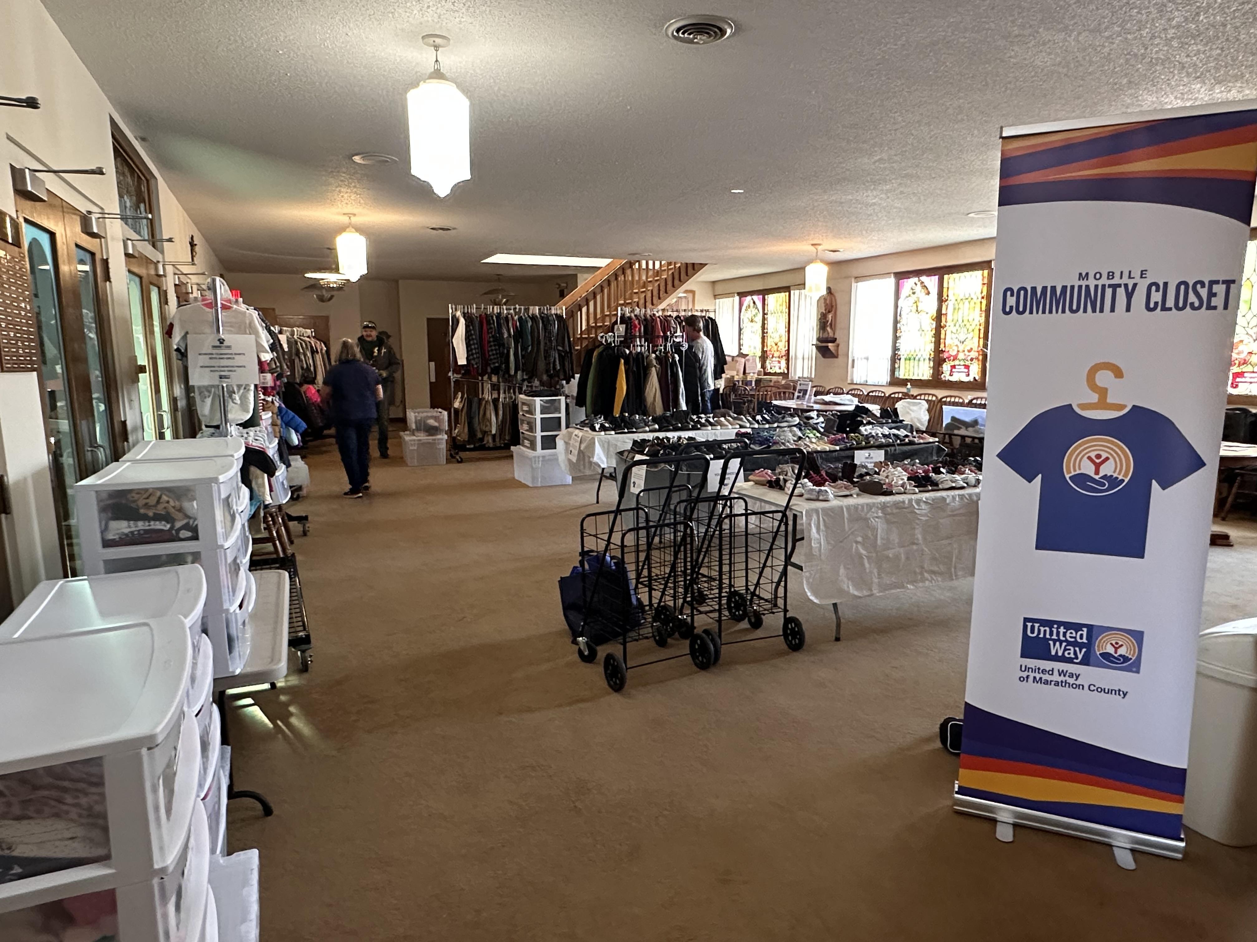 Clothes on tables and racks 