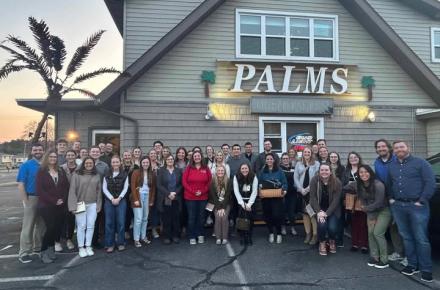 Group of people in front of a supper club.